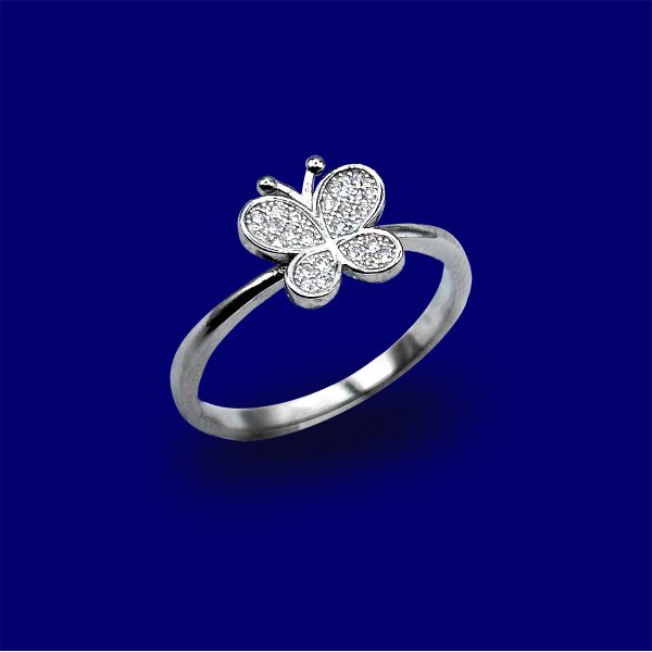 A silver ring with a butterfly on it's side.