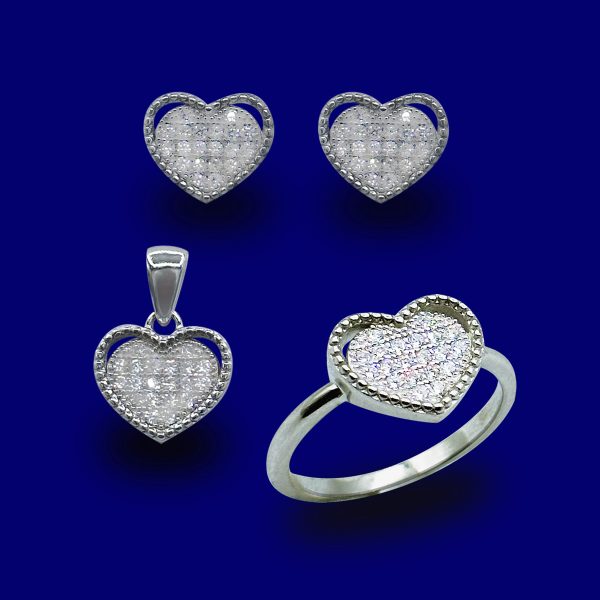 A heart shaped diamond set with matching earrings and ring.