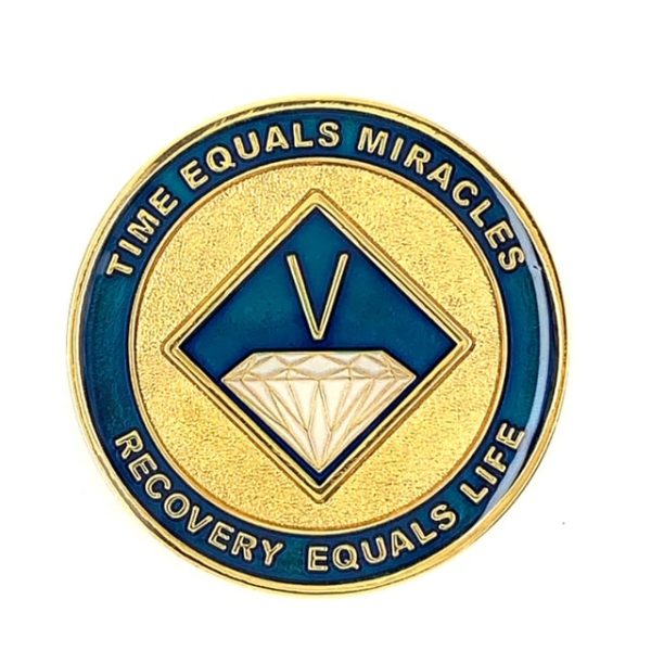 A blue and gold coin with the words " time equals miracles recovery equals life ".