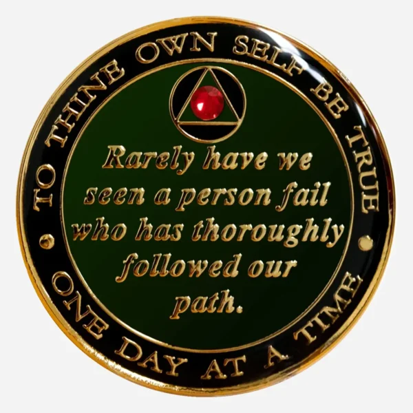 The Serenity Prayer in gold on a red AA medallion with a red crystal accent.