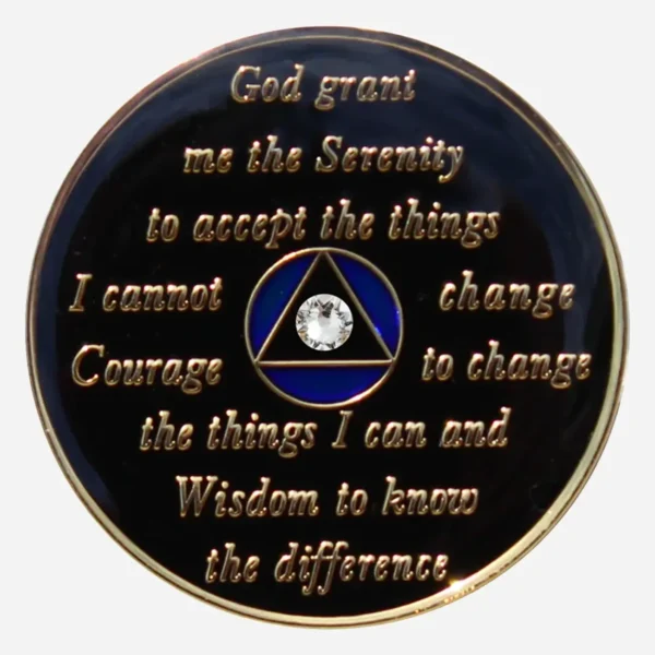 The Serenity Prayer is inscribed on the back of this blue Crystal AA Medallion, offering a message of peace and hope to guide individuals on their recovery journey.
