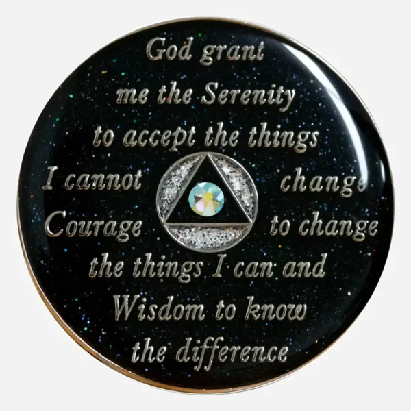 This image shows the back of the Silver/Comet Crystal AA Medallion, where the Serenity Prayer is inscribed, offering a message of hope and guidance for those who have embarked on the journey of recovery.