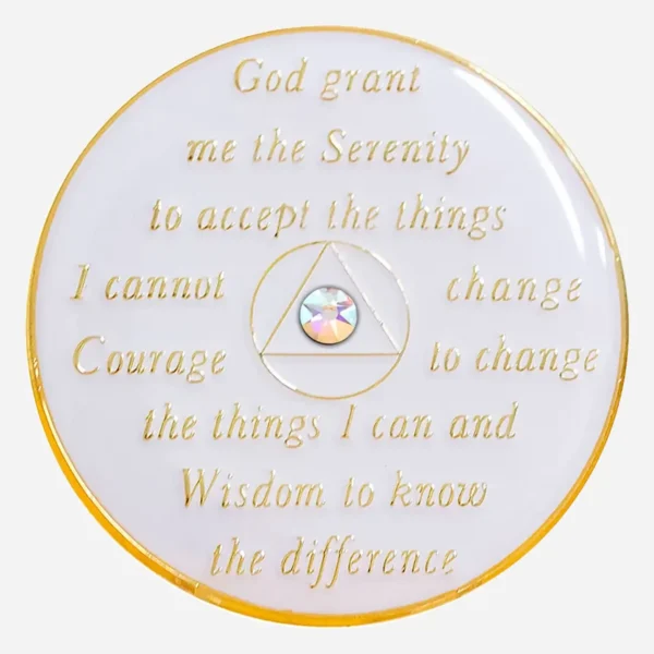 This image shows the back of the White/LGBTQ Rainbow Crystal AA Medallion, where the Serenity Prayer is inscribed, offering a message of hope and acceptance to all individuals within the recovery community.