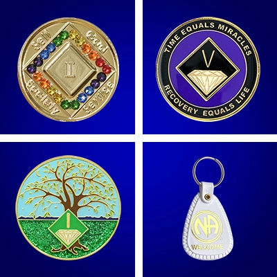 Four different designs of coins and a key chain.