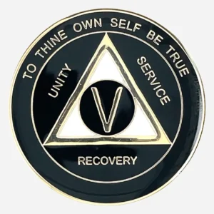 A black and pearl AA triplate token with gold accents, with the words "To Thine Own Self Be True" and "Unity Service Recovery" on the front of coin.