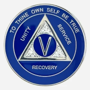 A blue and silver AA triplate token with silver glitter accents, and the words "To Thine Own Self Be True" at the top of coin, and "Unity, Service, Recovery" on the outside of an AA triangle symbol.